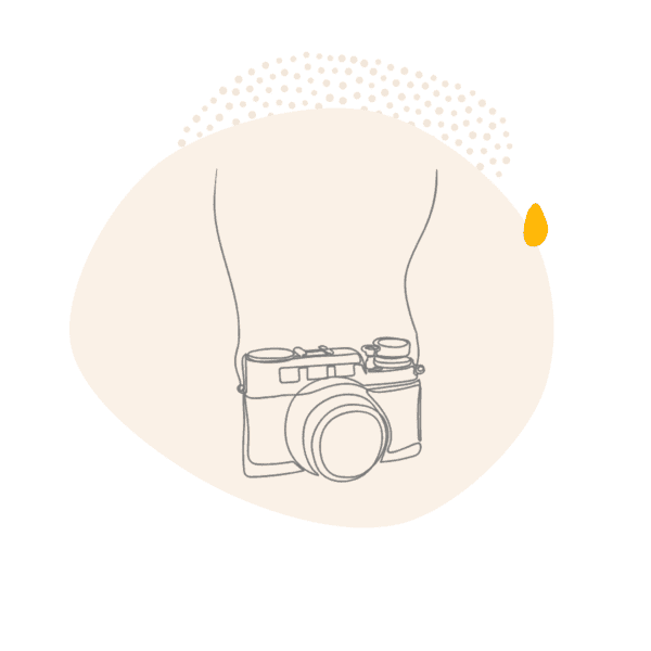 Line drawing of a camera on a strap